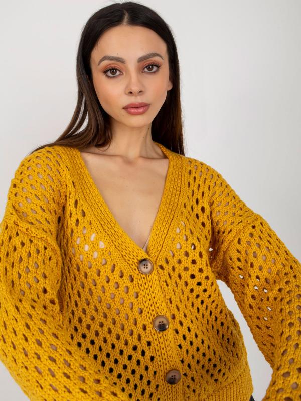 Tmavo žltý dierovaný oversized sveter
